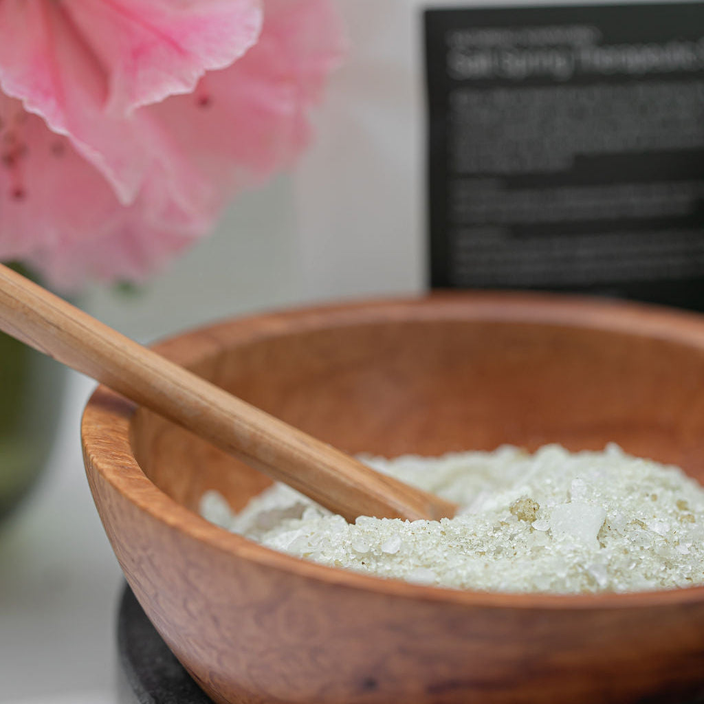 Wooden bowl with close up of saltspring therapeutic soak