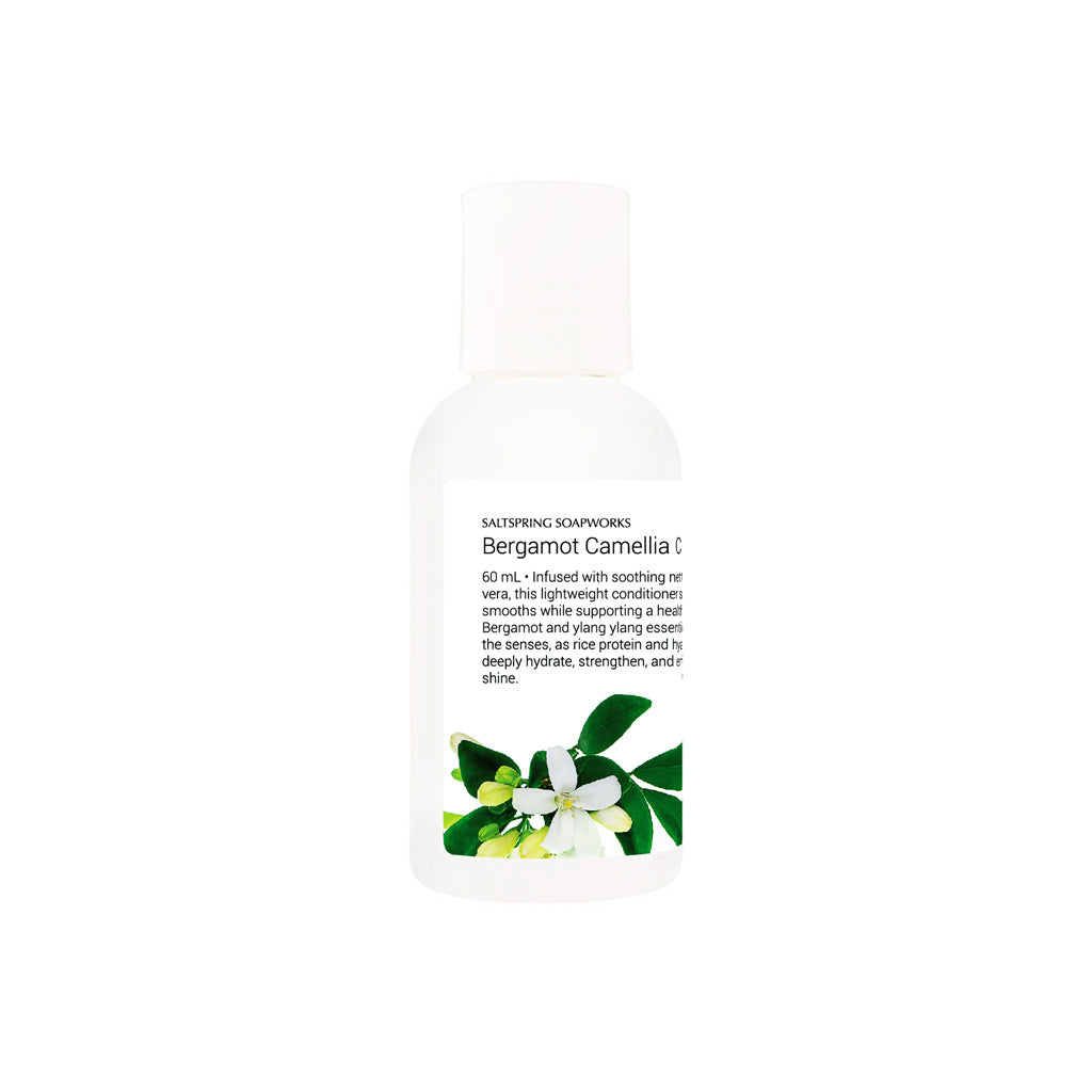 Saltspring Soapworks Bergamot Camellia travel size conditioner on white background