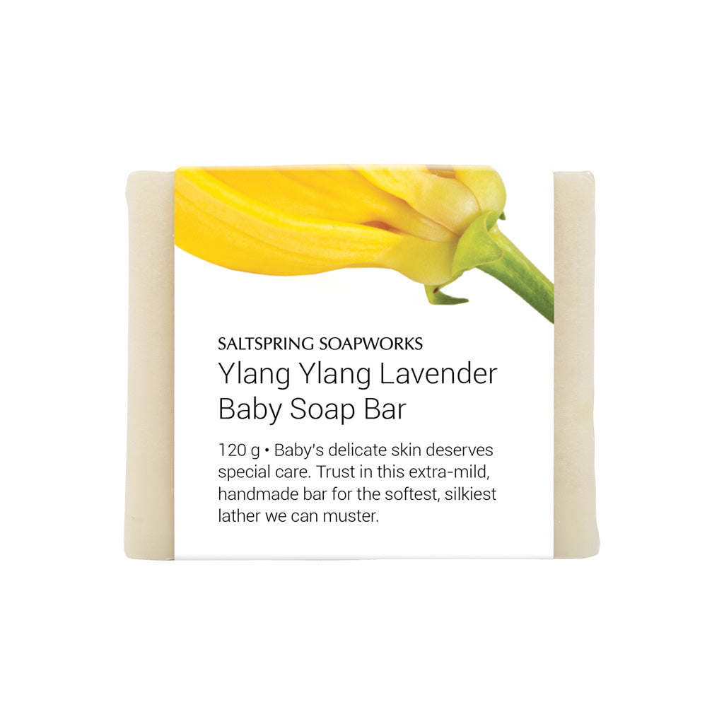 Saltspring Soapworks Ylang Ylang Lavender Baby Soap Bar, extra-mild handmade bar wrapped in paper with yellow ylang ylang flower
