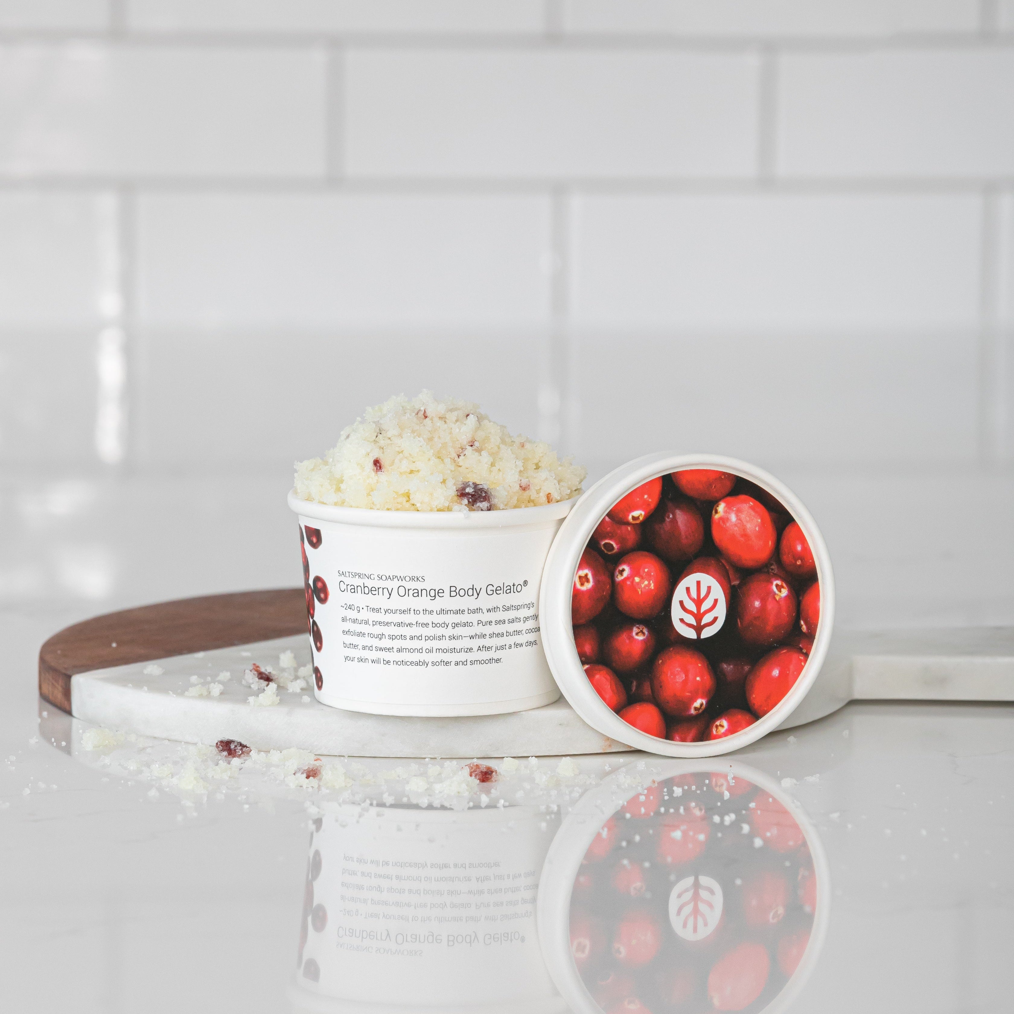 Cranberry Orange body scrub on a white surface